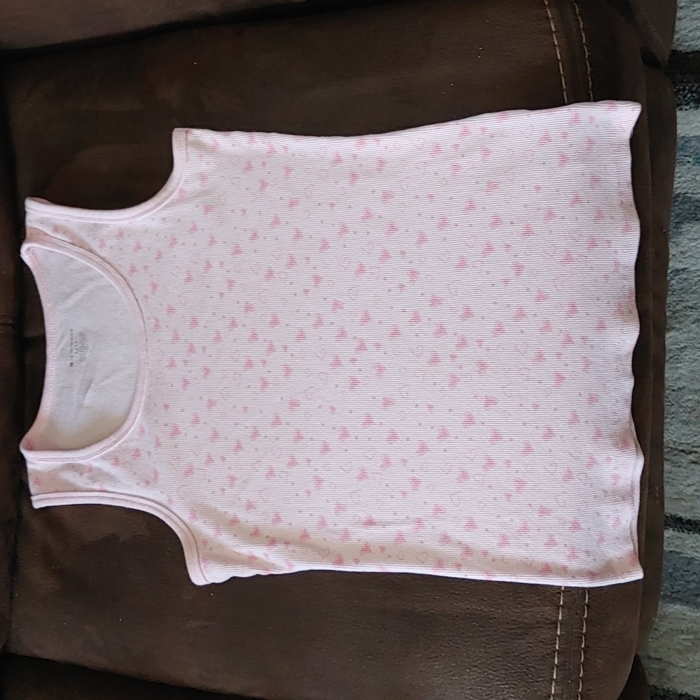 No bounties light pink tank top with heart designs on it, is a childrens large